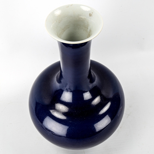 1075 - A Chinese dark blue glaze porcelain narrow-neck vase, seal mark under base, height 36cm