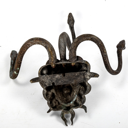 1077 - A patinated bronze wall-hanging coat rack in the form of Medusa, overall height 29cm