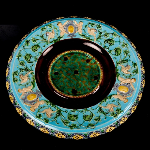 1081 - Minton Majolica platter, with relief moulded Classical border, diameter 26cm