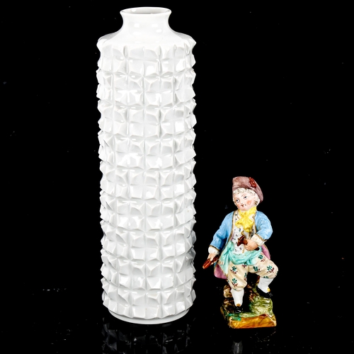 1084 - A Meissen white glaze porcelain modernist vase, height 23cm, and a Meissen porcelain Classical figur... 