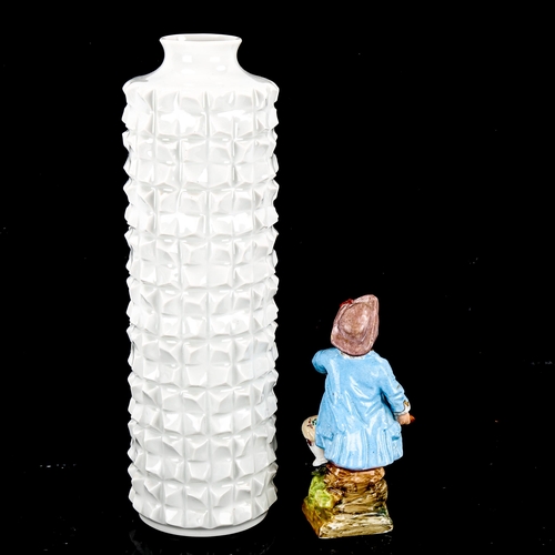 1084 - A Meissen white glaze porcelain modernist vase, height 23cm, and a Meissen porcelain Classical figur... 