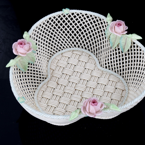 1107 - Belleek 4 strand trefoil basket with coloured floral mounts, 1955 - 1979, length 17cm