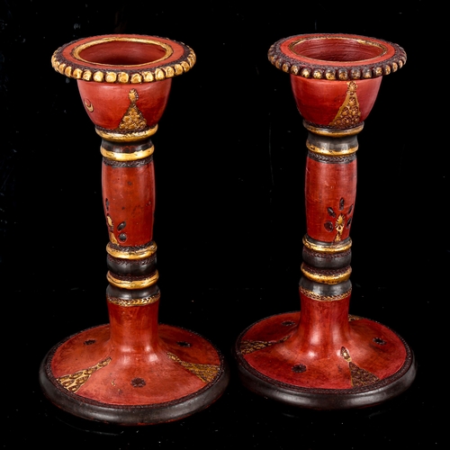 1127 - A pair of Turkish Tophane red and gilt pottery candlesticks, height 18cm