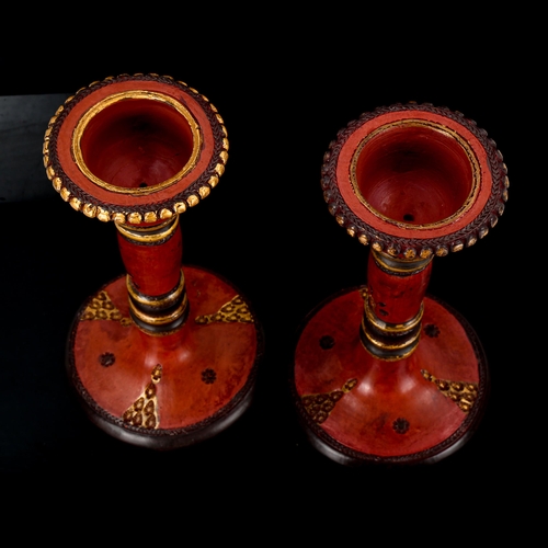 1127 - A pair of Turkish Tophane red and gilt pottery candlesticks, height 18cm