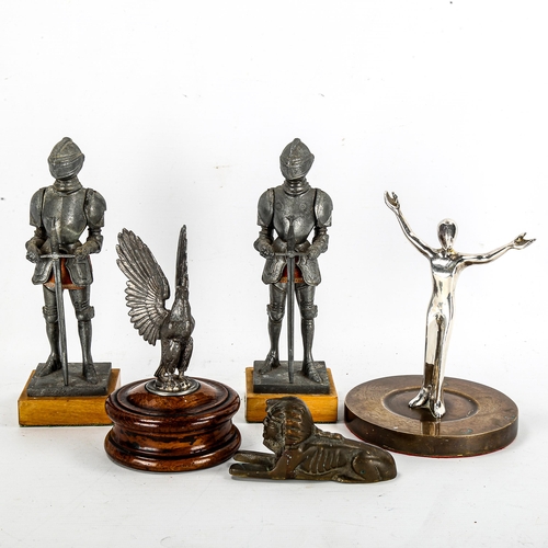 1132 - A pair of spelter knights in armour, height 21cm, a spelter eagle on oak plinth, and 2 other ornamen... 