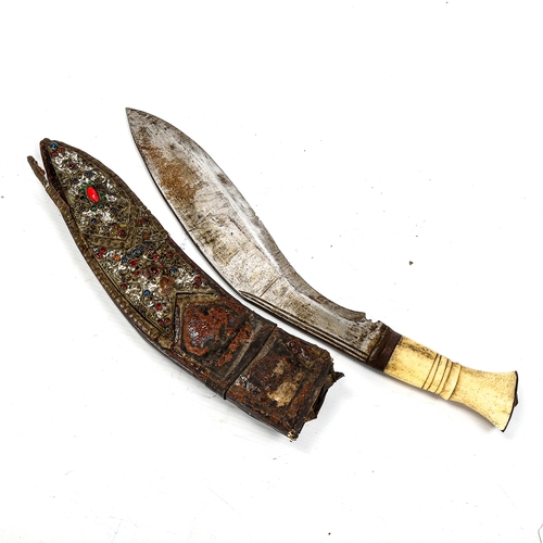 1147 - A Malayan kukri knife, early 20th century, with bone hilt and jewelled scabbard, length 42cm