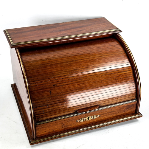 1165 - A 19th century mahogany and brass inlaid tambour-front stationery cabinet, width 39cm