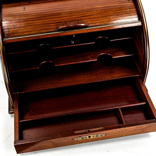 1165 - A 19th century mahogany and brass inlaid tambour-front stationery cabinet, width 39cm