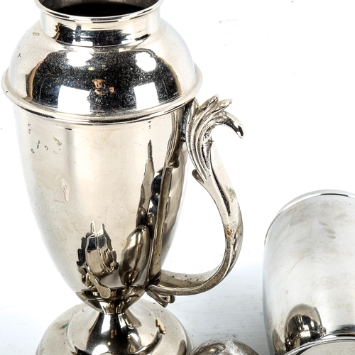 1192 - A nickel plate cockerel design cocktail shaker, height 33cm, and a chrome plate rocket ship design c... 