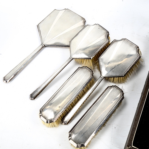 1193 - An Art Deco 5-piece silver-backed brush and mirror set, boxed