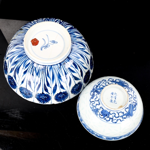 1198 - A Chinese blue and white porcelain bowl with chrysanthemum decoration, diameter 19.5cm (A/F), and a ... 