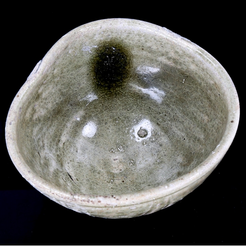 1199 - A Chinese olive glaze pottery bowl, width 15cm