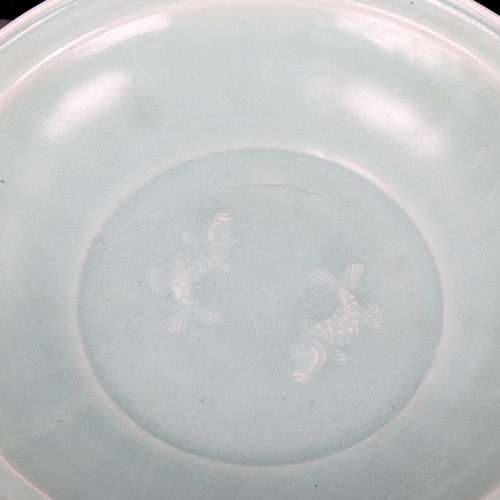 1200 - A Chinese celadon glaze porcelain bowl, with moulded fish design, diameter 25cm