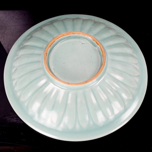 1200 - A Chinese celadon glaze porcelain bowl, with moulded fish design, diameter 25cm