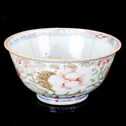 1201 - A Chinese porcelain bowl with painted floral decoration, diameter 15cm (A/F)