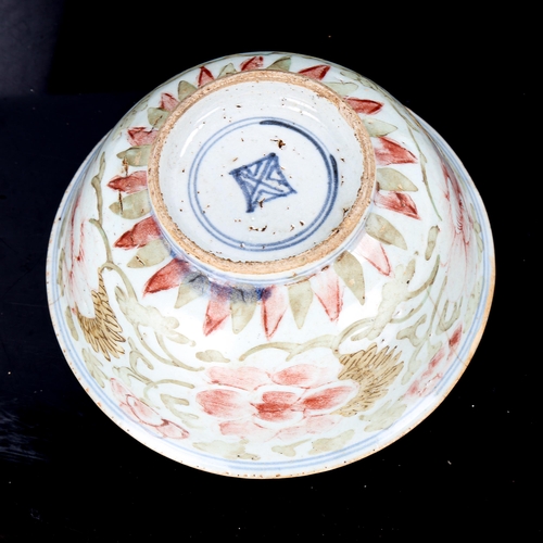 1201 - A Chinese porcelain bowl with painted floral decoration, diameter 15cm (A/F)