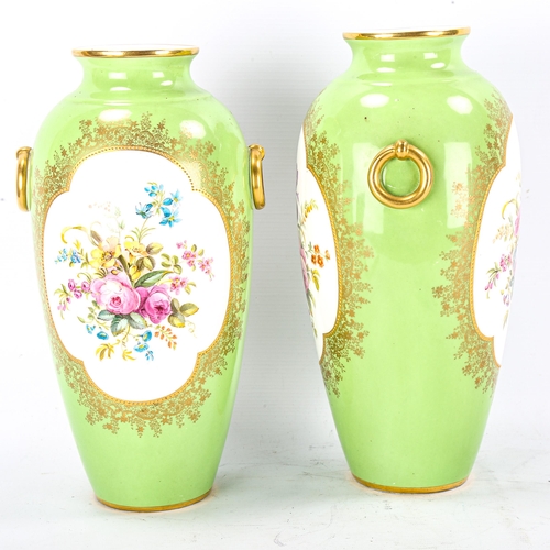 1247 - A pair of Cauldon green ground porcelain vases with hand painted botanical panels, signed B Harrison... 