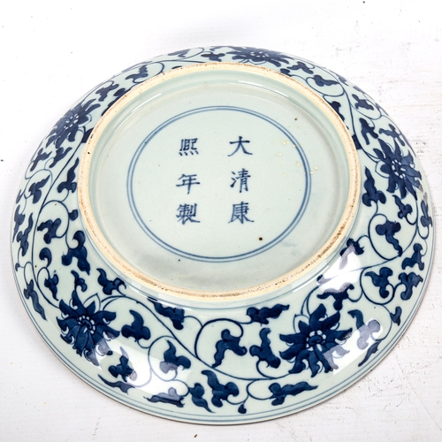 1252 - A Chinese blue and white porcelain dragon bowl, 6 character mark, diameter 28cm