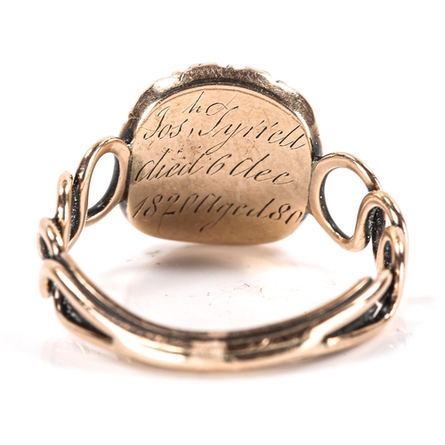 186 - A Georgian memorial ring, unmarked gold settings with central woven hair panel under convex glass su... 