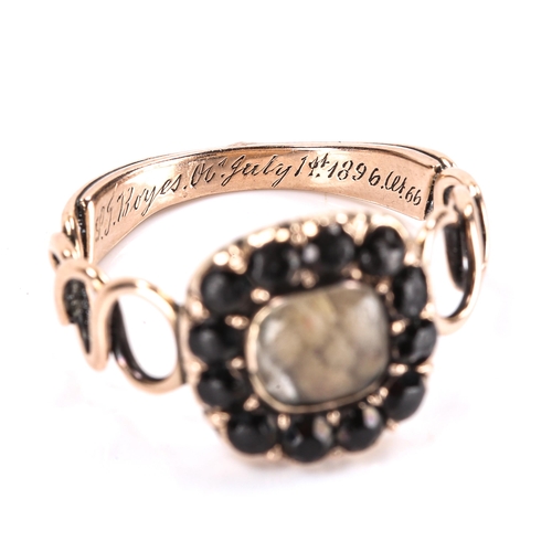 186 - A Georgian memorial ring, unmarked gold settings with central woven hair panel under convex glass su... 