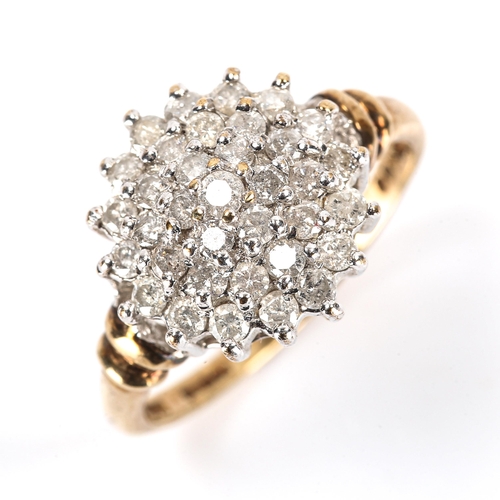 191 - A modern 9ct gold diamond cluster ring, set with modern round brilliant-cut diamonds, total diamond ... 