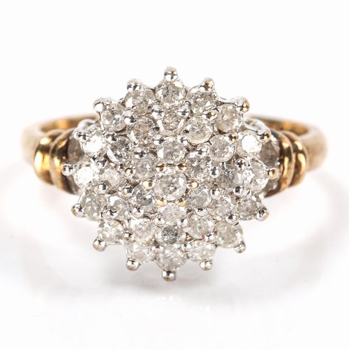 191 - A modern 9ct gold diamond cluster ring, set with modern round brilliant-cut diamonds, total diamond ... 