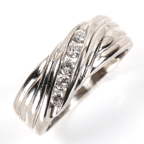 195 - A large modern platinum diamond wedding band ring, set with modern round brilliant-cut diamonds, tot... 