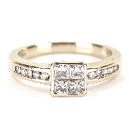 196 - A modern 18ct gold diamond ring set with Princess and round brilliant-cut diamonds, total diamond co... 