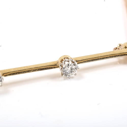 200 - An unmarked gold 3-stone diamond bar brooch, set with round brilliant-cut diamonds, total diamond co... 