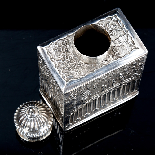 208 - A 17th/18th century Chinese export silver tea caddy, relief embossed decoration, with fluted lid and... 