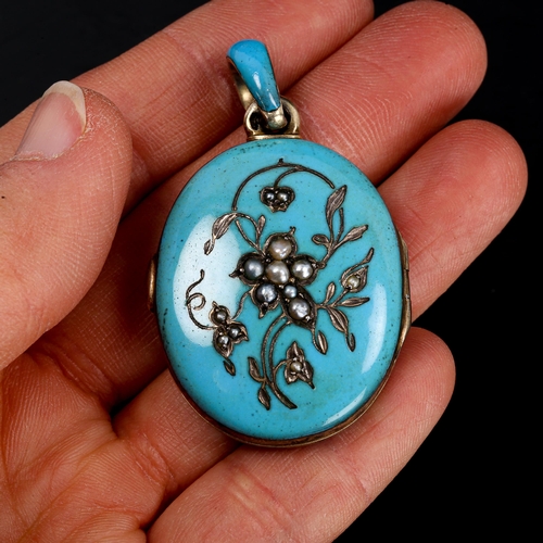 212 - A Victorian Continental silver blue enamel and split pearl locket pendant, engraved floral design wi... 