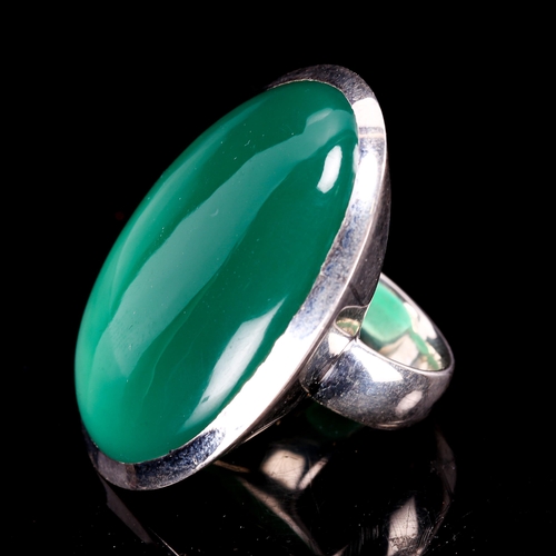 220 - A large modern silver green agate dress ring, setting height 37.4mm, size I/J, 22.3g