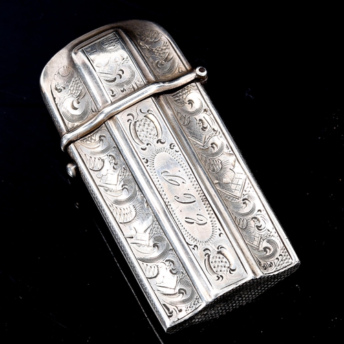 227 - An Antique Dutch silver Vesta case, shaped form with bright-cut engraved decoration, 6cm x 3cm