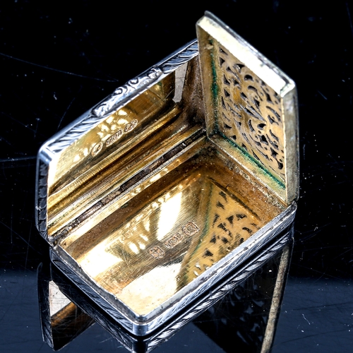 232 - A Victorian silver vinaigrette, rectangular form with allover engraved foliate decoration, pierced a... 