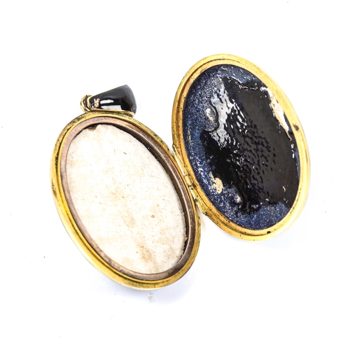 233 - A Victorian pearl and black enamel mourning pendant locket, unmarked yellow metal settings, pendant ... 