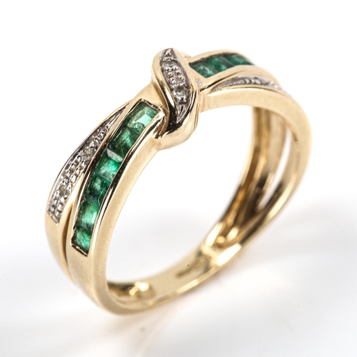 236 - A modern 9ct gold emerald and diamond crossover ring, setting height 5.9mm, size J, 2g