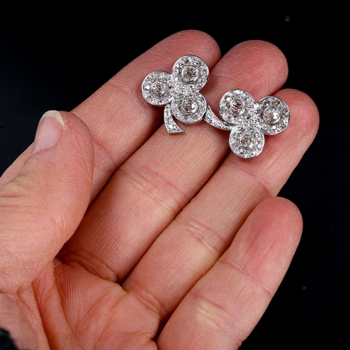 248 - A fine pair of diamond shamrock stud earrings, unmarked white gold settings with old-cut diamonds, t... 