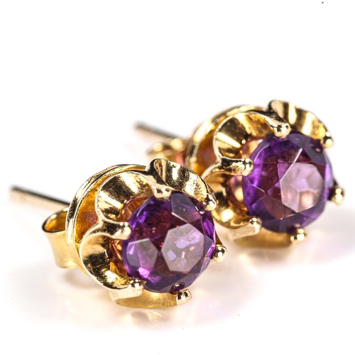 249 - A pair of late 20th century 9ct gold amethyst stud earrings, hallmarks London 1977, earring diameter... 