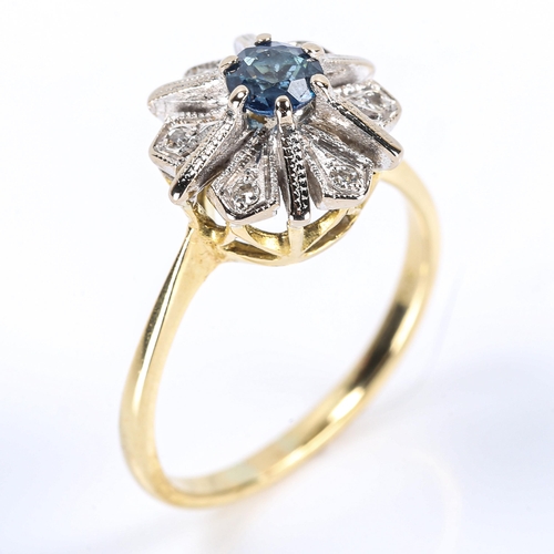 250 - A late 20th century 18ct gold sapphire and diamond cluster snowflake ring, set with round-cut sapphi... 