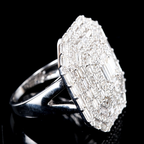 253 - A large modern 9ct white gold diamond cluster panel ring, pave set with baguette and round brilliant... 