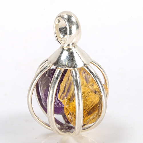 258 - A modern unmarked silver rough-cut gem cage pendant, set with amethyst and citrine, pendant height 3... 