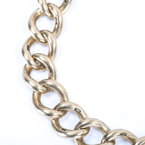 265 - A heavy 9ct gold flat curb link bracelet, hallmarks Birmingham 1972, bracelet length 24cm, 61.5g