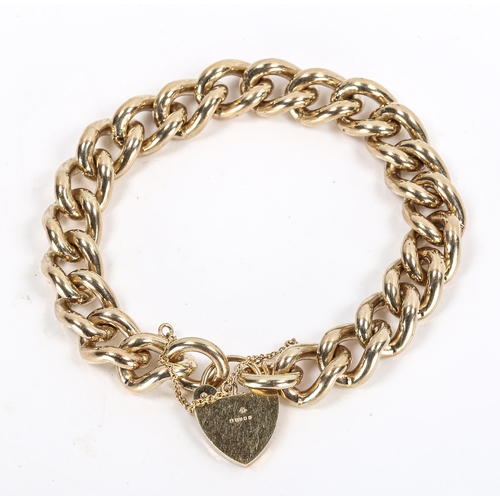 266 - A heavy 9ct gold curb link bracelet, with heart padlock, hallmarks London 1976, bracelet length 17cm... 