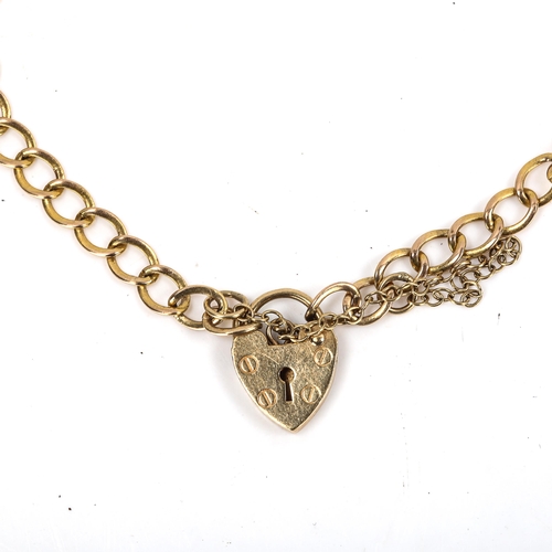 282 - A small 9ct gold flat curb link bracelet with heart padlock, length 16cm, 3.3g