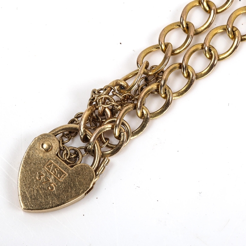 282 - A small 9ct gold flat curb link bracelet with heart padlock, length 16cm, 3.3g