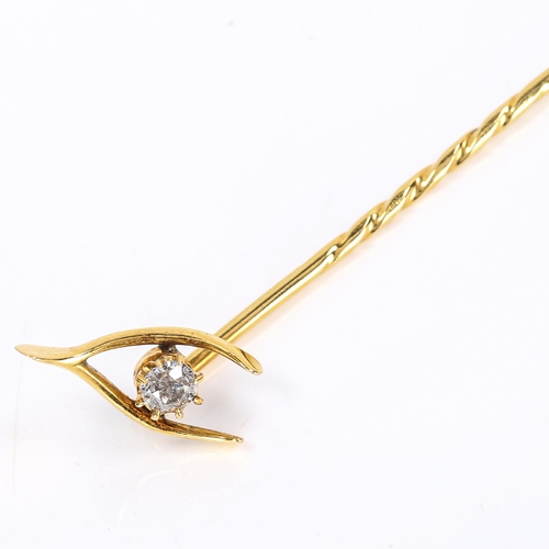 297 - A Victorian unmarked gold diamond wishbone stickpin set with old-cut diamond, head width 13.6mm, 1.6... 