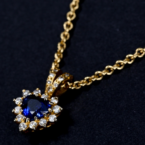 299 - An 18ct gold sapphire and diamond demi-parure, comprising heart cluster pendant necklace and pair of... 