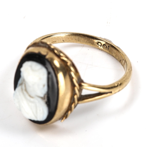 303 - A Vintage 9ct gold relief carved hardstone cameo ring, depicting female portrait, setting height 15.... 