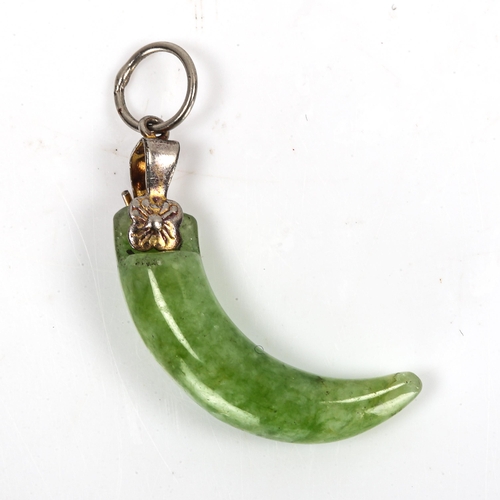 311 - A Chinese carved and polished jade claw design pendant, height excluding bale 24.1mm, 2.3g