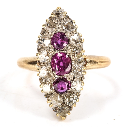 312 - An Edwardian 18ct gold ruby and diamond marquise cluster ring, set with oval and round-cut rubies wi... 